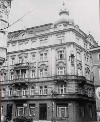 Franz Kafka in a cafe in prague in 1910s : r/midjourney